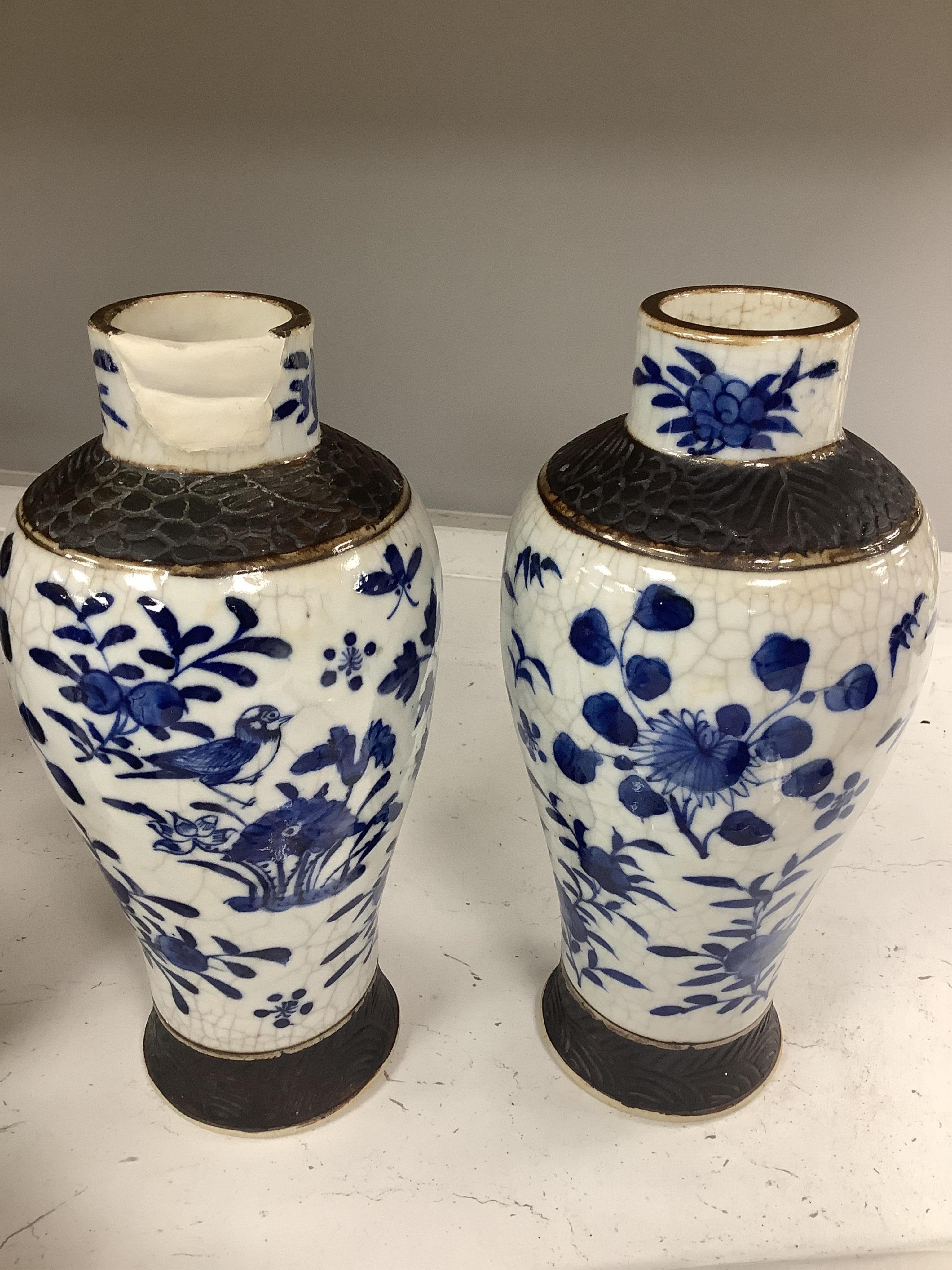 Three pairs of Chinese vases, a teapot, two bowls and a pair of miniature Satsuma vases, tallest item crackleware vases and covers 32cm high. Condition - poor